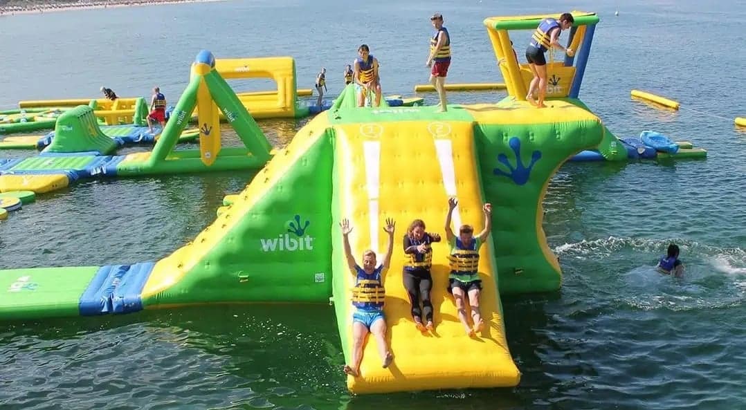 Inflatable aqua park at Rainbow Bay